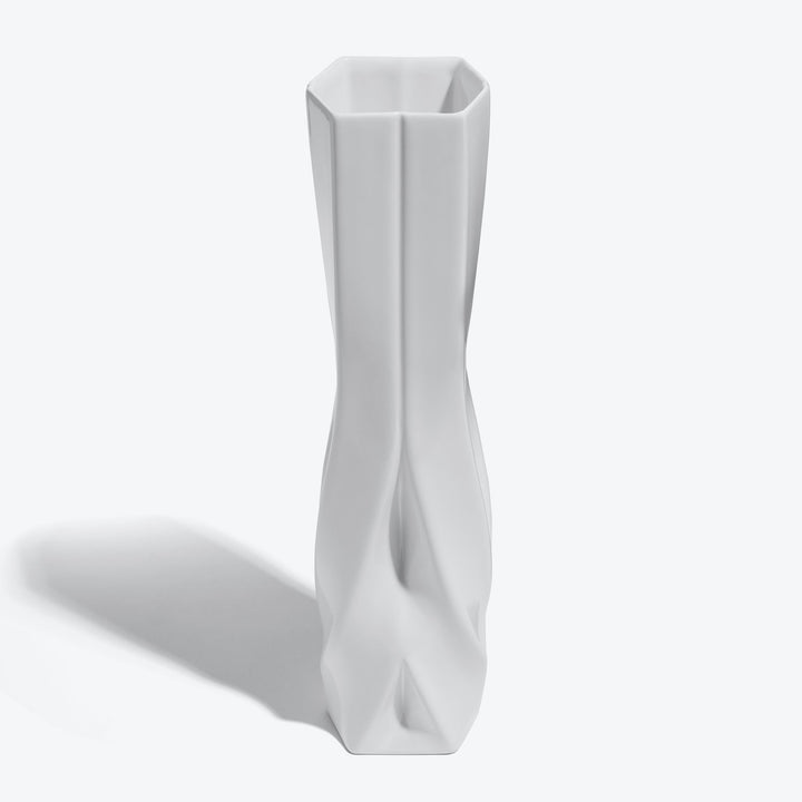Braid Vase — Tall white porcelain vase from a raised angle showing its hexagonal opening