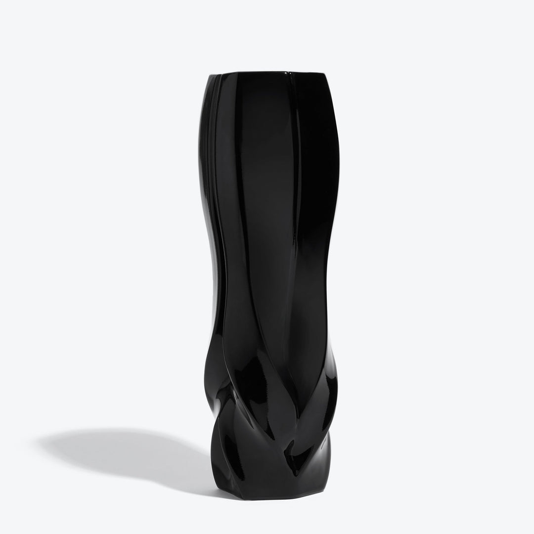 Braid Vase — Waist black porcelain vase, three-quarter view showing its pinched middle