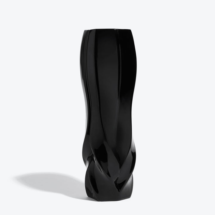 Braid Vase — Waist black porcelain vase, three-quarter view showing its pinched middle