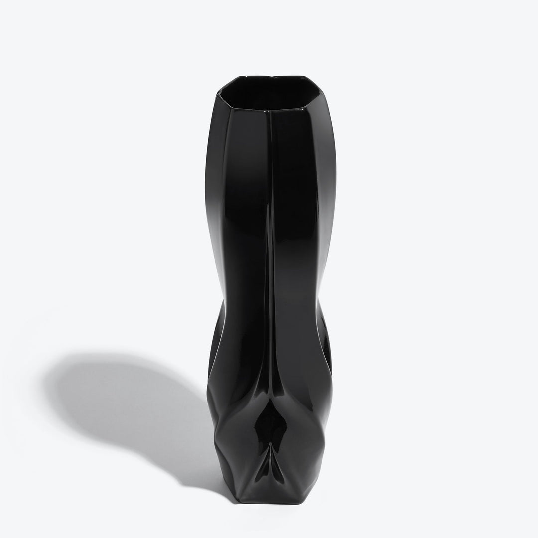 Braid Vase — Waist black porcelain vase from a raised angle showing its hexagonal opening