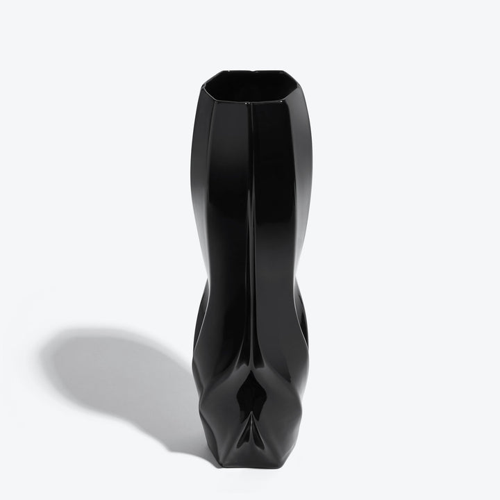 Braid Vase — Waist black porcelain vase from a raised angle showing its hexagonal opening