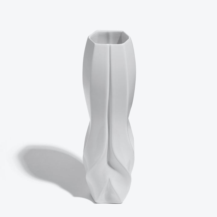 Braid Vase — Waist white porcelain vase from a raised angle showing its hexagonal opening