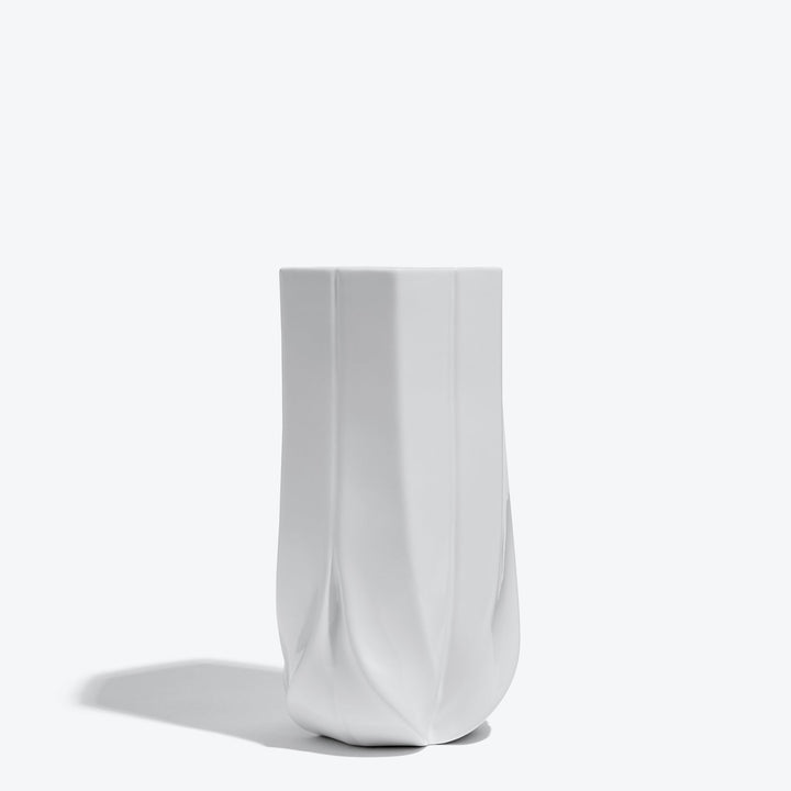 Braid Vase — Wide white porcelain vase, three-quarter view on a white background