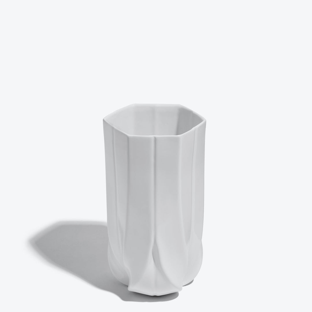 Braid Vase — Wide white porcelain vase from a raised angle showing its hexagonal opening