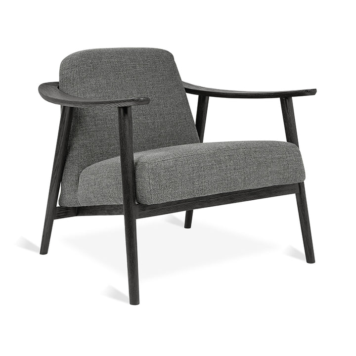 Elegant gray upholstered armchair with dark wood frame, modern designer furniture