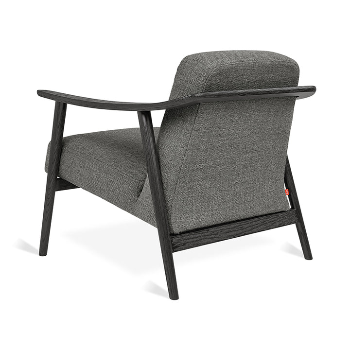Elegant charcoal wool armchair with dark oak frame, designer mid-century modern lounge chair