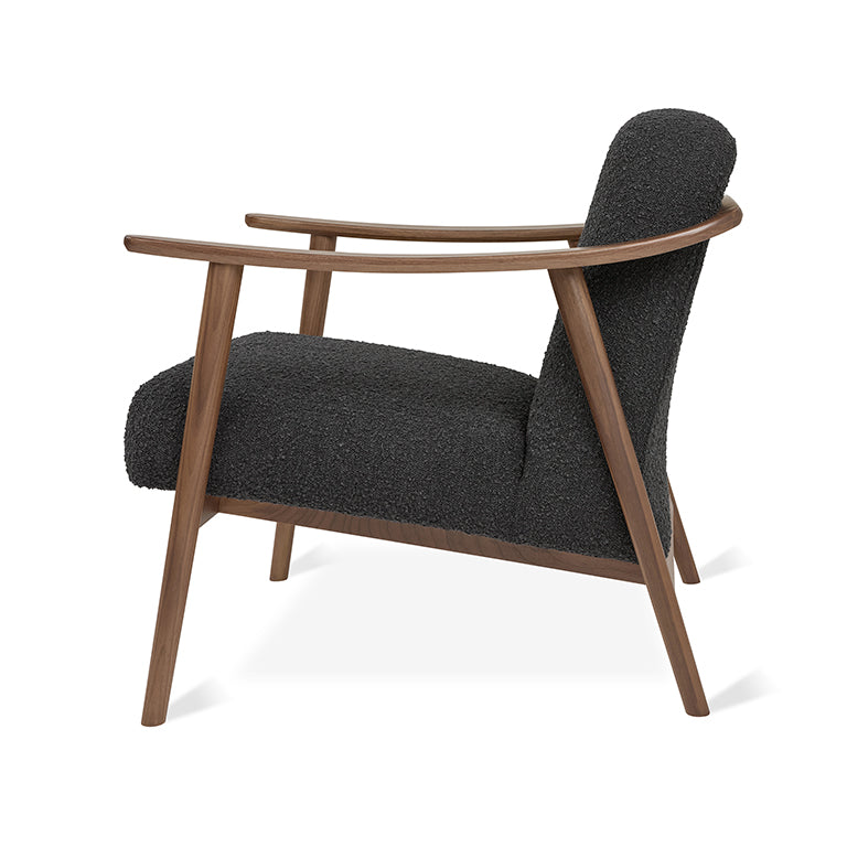 Mid-century modern armchair with walnut frame and textured charcoal upholstery