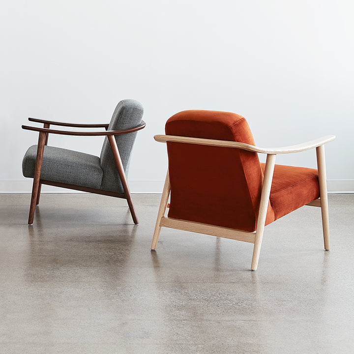 Mid-century modern armchairs in gray wool and terracotta velvet with walnut and oak frames