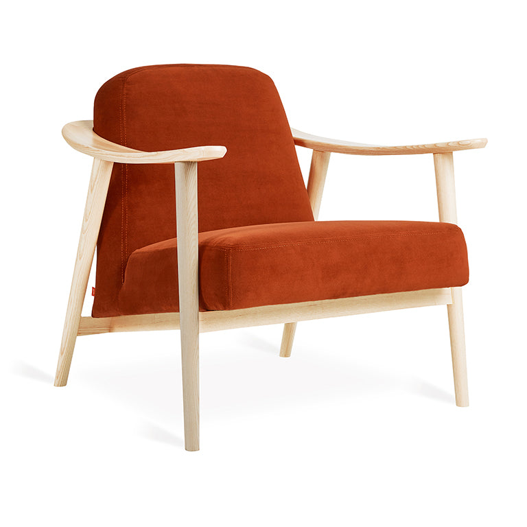 Rust velvet armchair with light oak frame, modern designer furniture