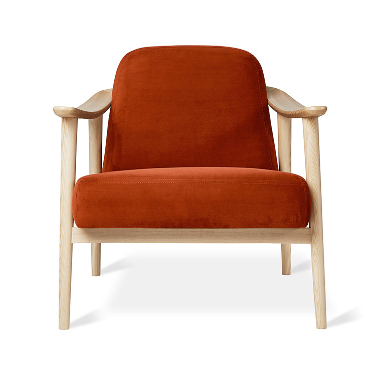 Rust velvet armchair with light oak frame, modern designer furniture