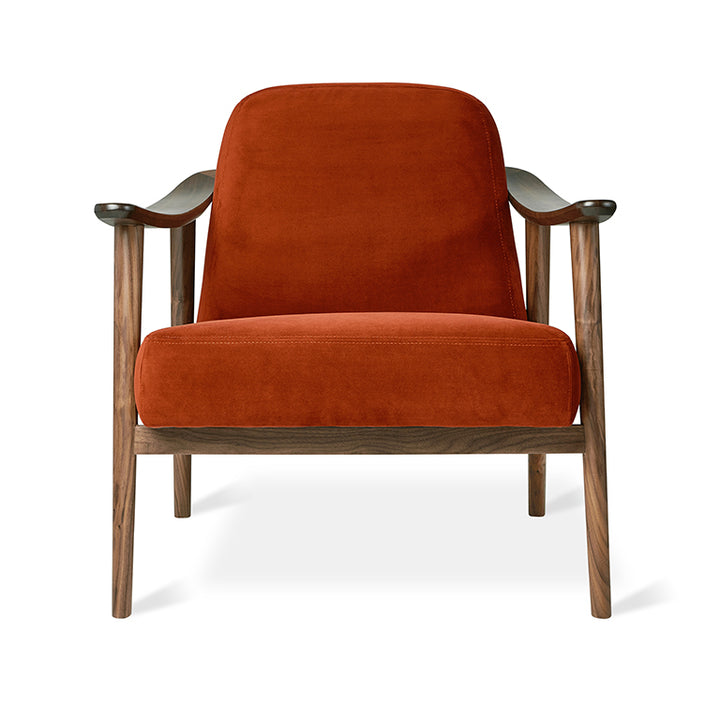 Rust velvet armchair with walnut wood frame, modern designer furniture