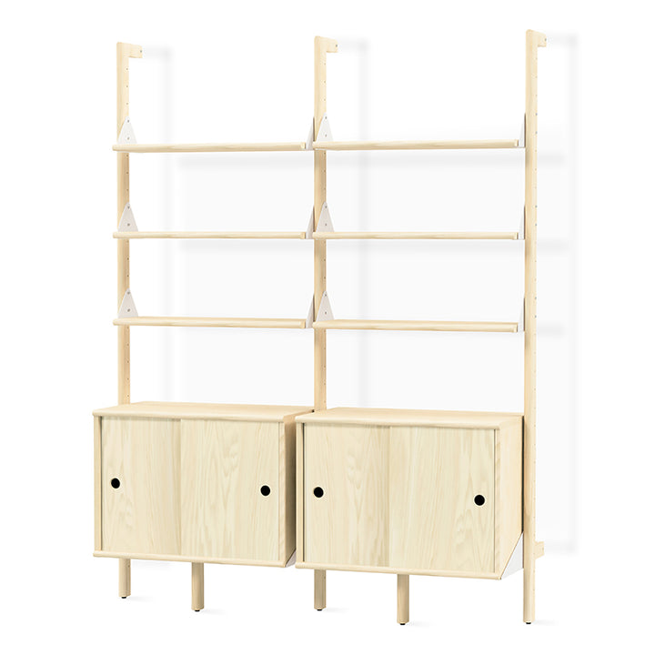 Light wood modular shelving with sleek cabinets, minimalist design