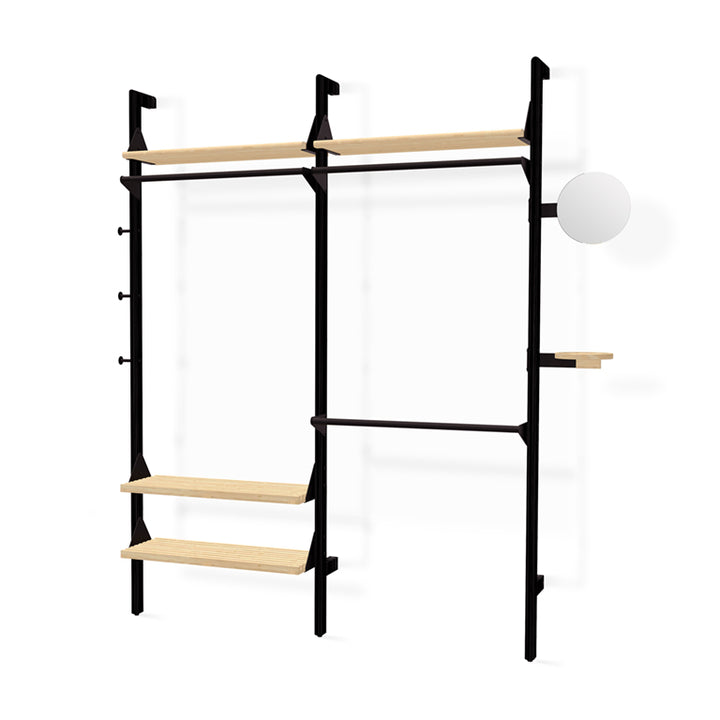 Minimalist black metal shelving with light wood shelves and round mirror accent