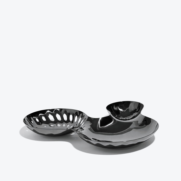 Cell Bowl — large black three-well bowl with pierced cells, side view on a white background