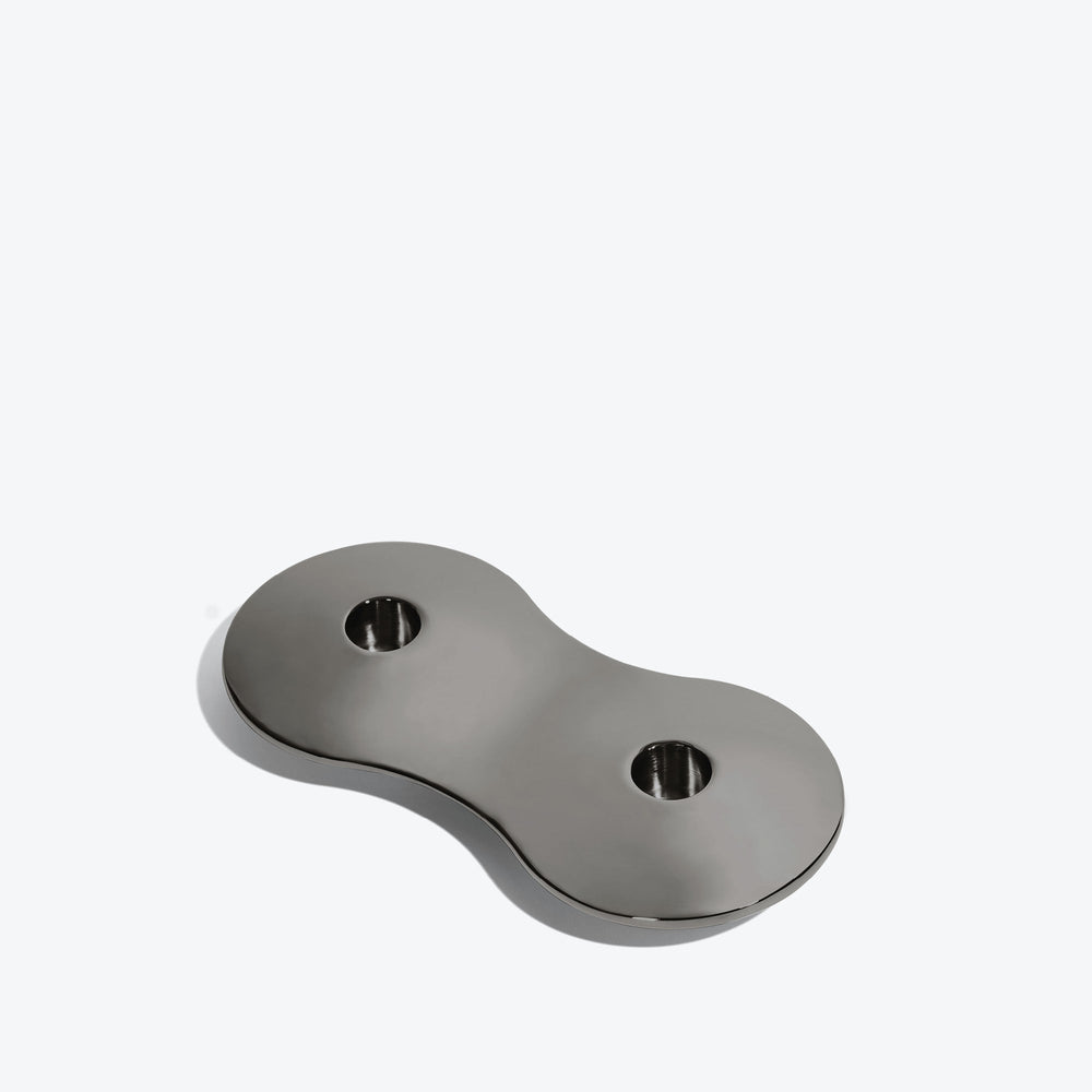 Cell Candle Holder — small black two-candle piece, three-quarter view from above