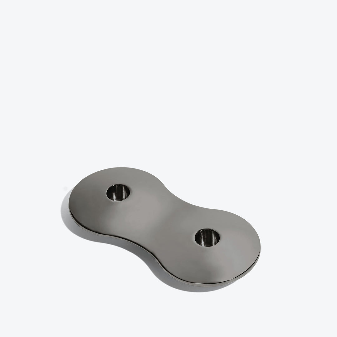 Cell Candle Holder — small black two-candle piece, three-quarter view from above