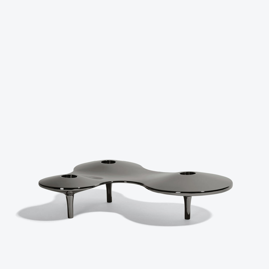 Cell Candle Holder — medium black three-candle piece on short legs, low side view on white