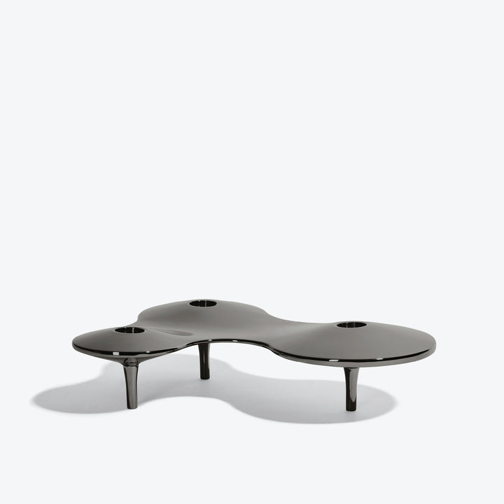 Cell Candle Holder — medium black three-candle piece on short legs, low side view on white