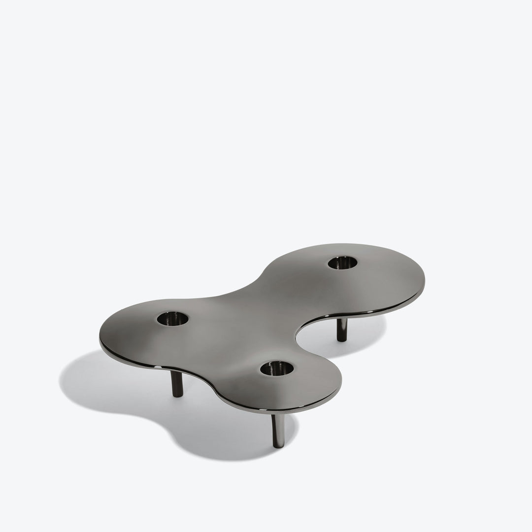 Cell Candle Holder — medium black three-candle piece on short legs, three-quarter view from above