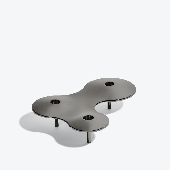 Cell Candle Holder — medium black three-candle piece on short legs, three-quarter view from above