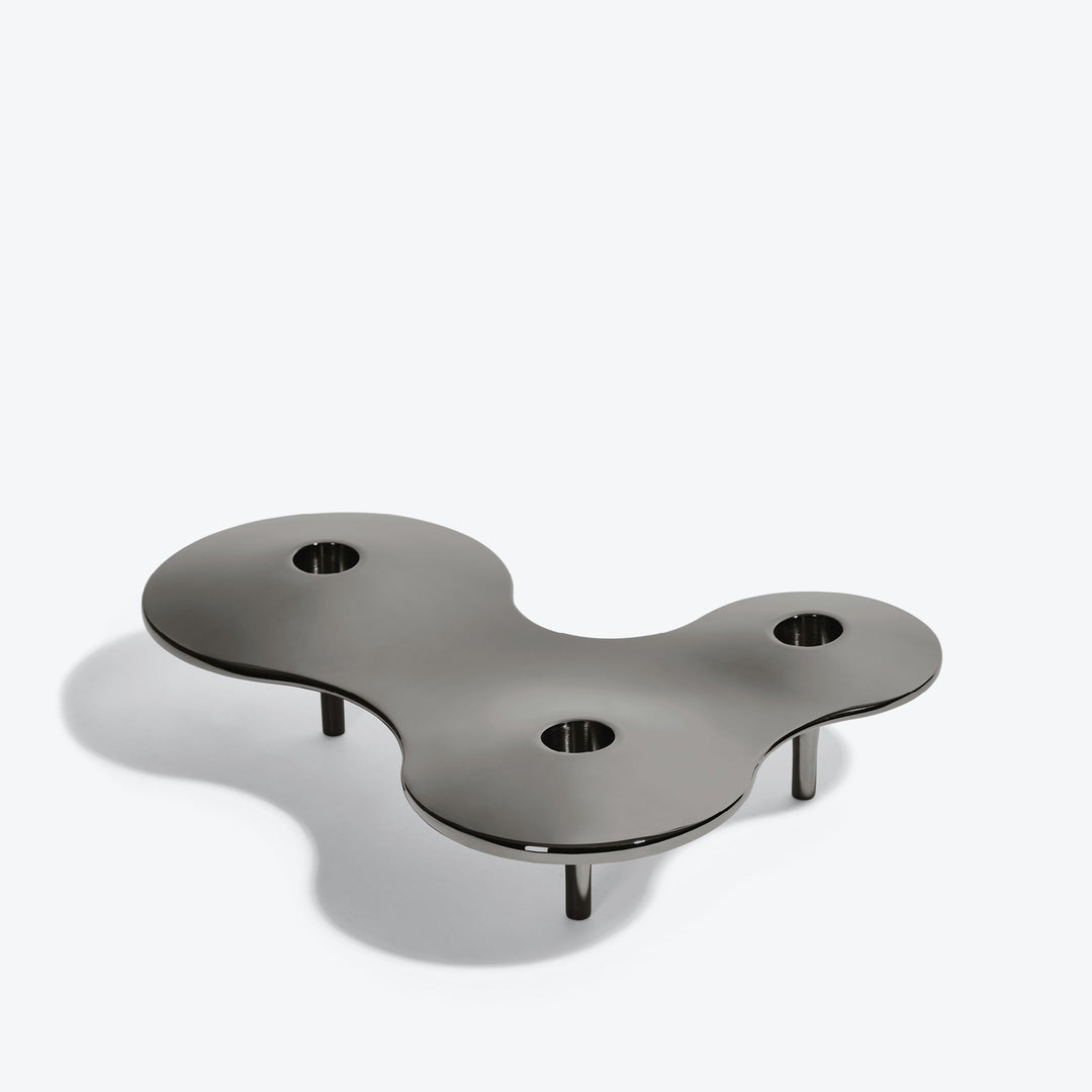 Cell Candle Holder — medium black three-candle piece, alternate angle from above showing its curved outline