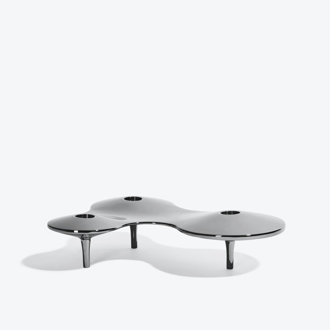 Cell Candle Holder — medium silver three-candle piece on short legs, low side view on white