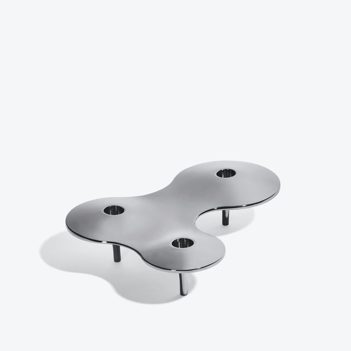 Cell Candle Holder — medium silver three-candle piece on short legs, three-quarter view from above
