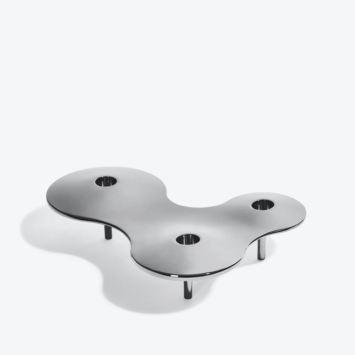 Cell Candle Holder — medium silver three-candle piece, alternate angle from above showing its curved outline