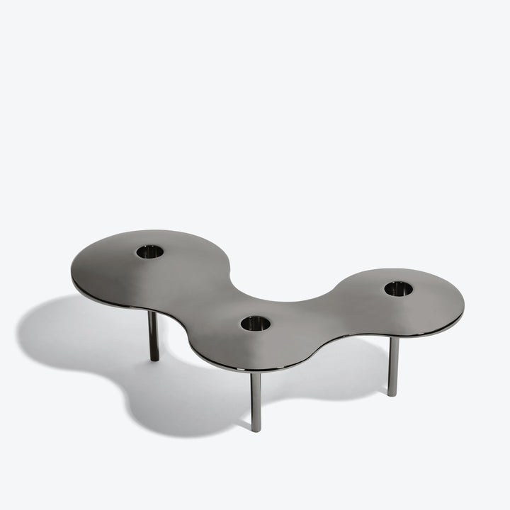 Cell Candle Holder — large black three-candle piece on tall legs, alternate angle from above