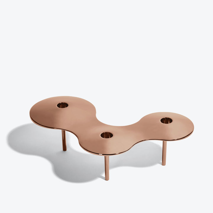 Cell Candle Holder — large rose gold three-candle piece on tall legs, alternate angle from above