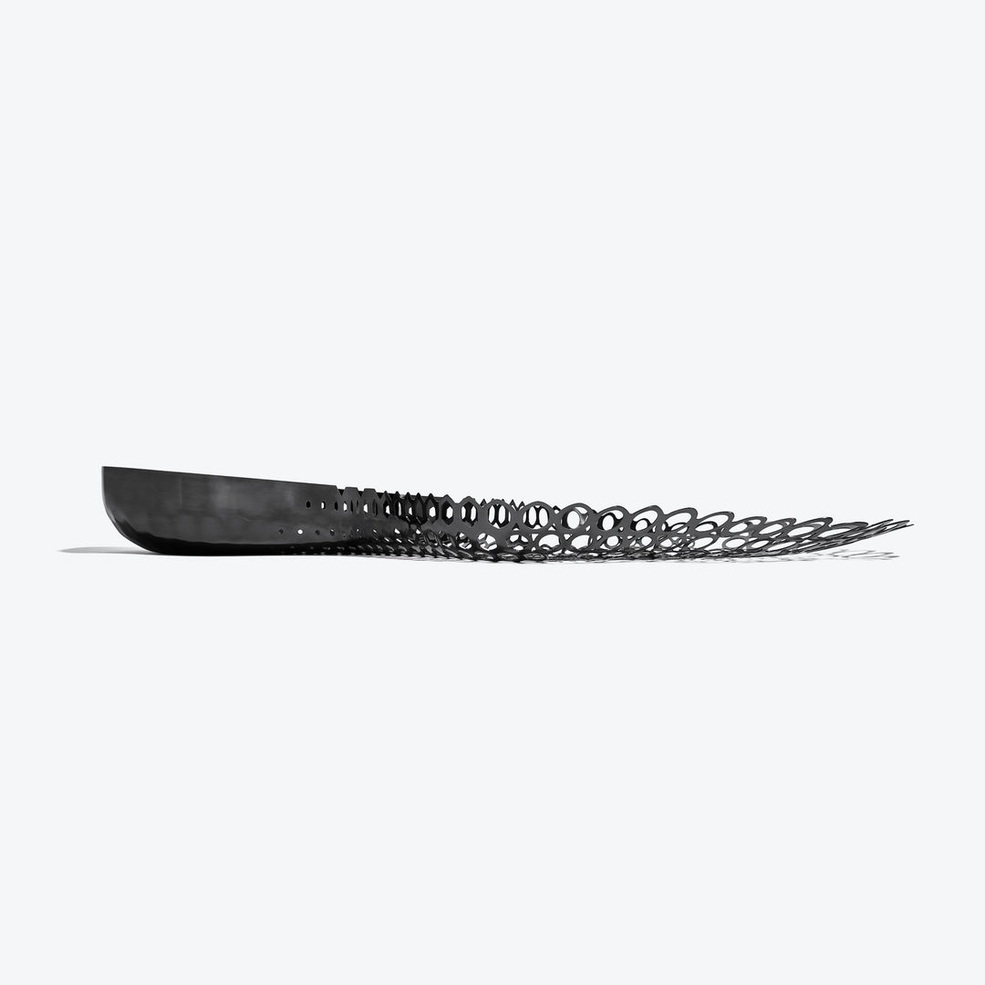 Cell Centerpiece — black stainless steel centerpiece, low side profile on a white background