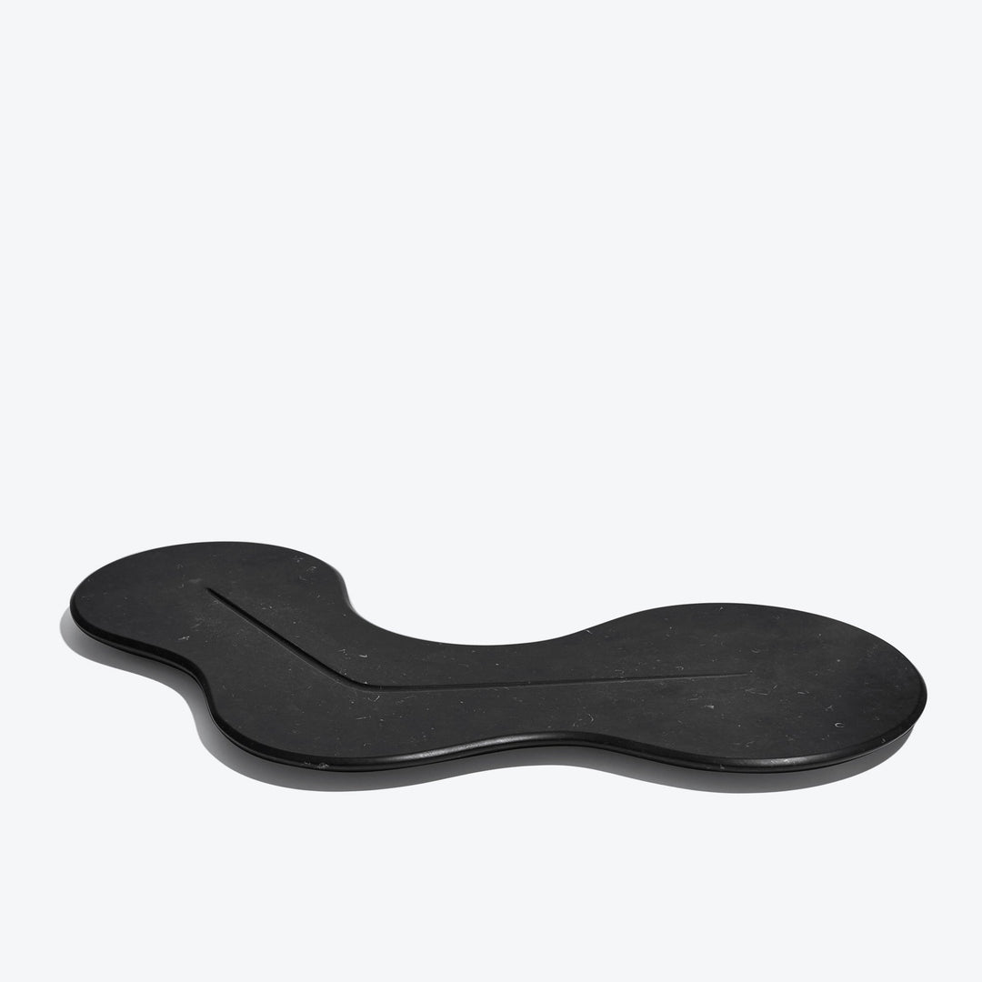 Cell Platter — black marble platter, low side angle on a white background