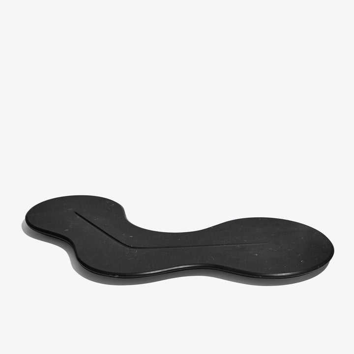 Cell Platter — black marble platter, low side angle on a white background