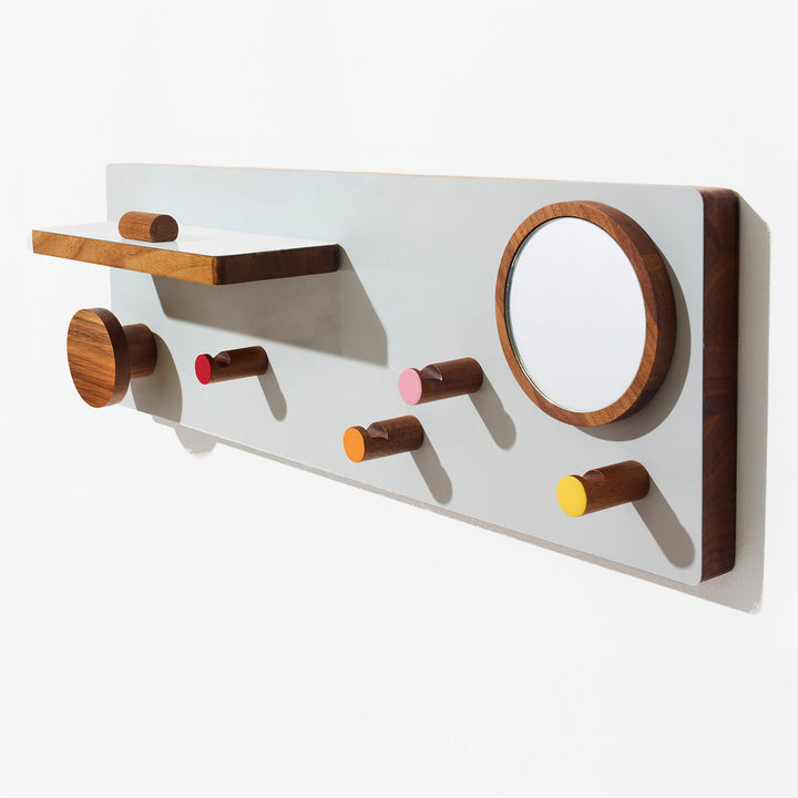 Walnut wall organizer with hooks, circular mirror, and minimalist shelf, modern design