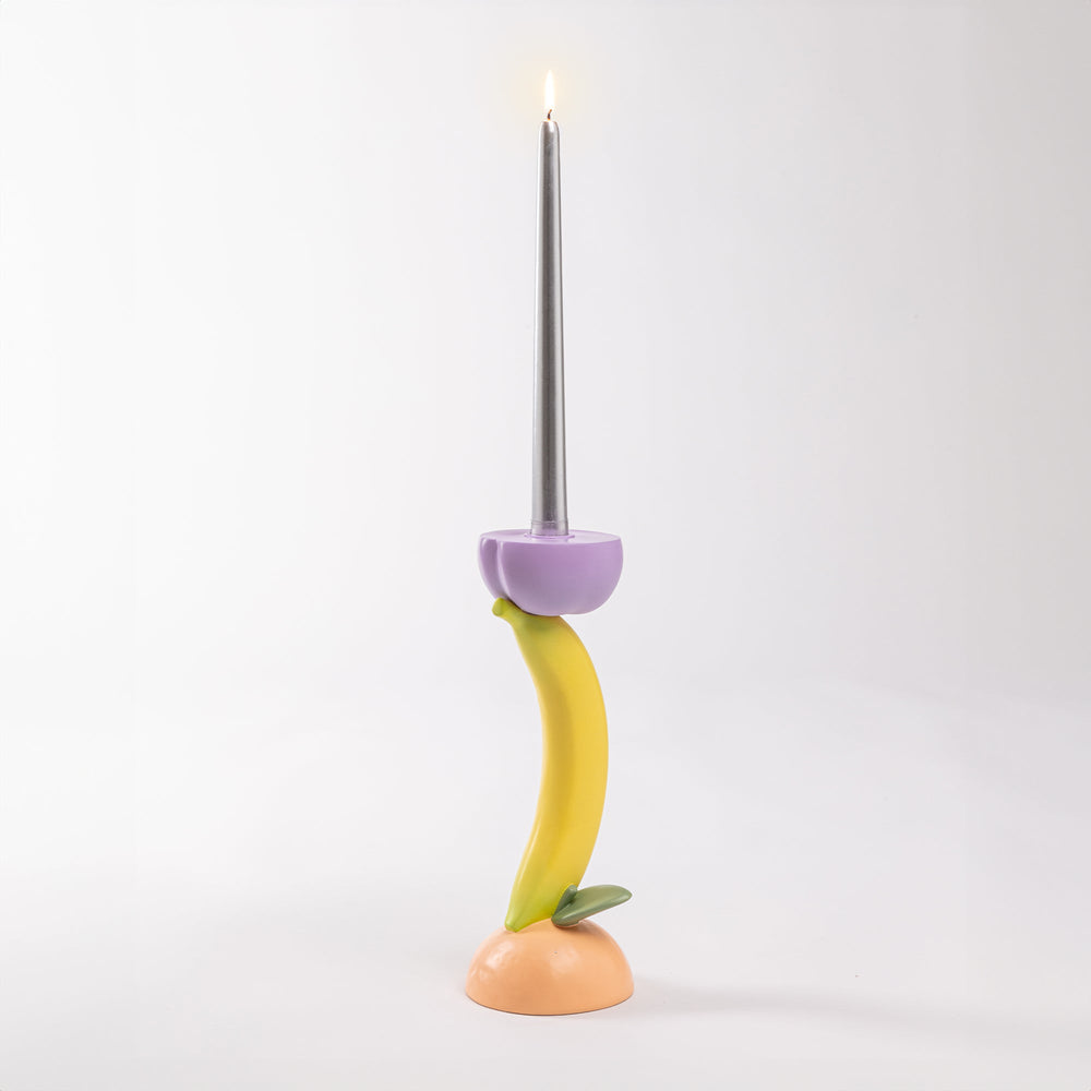 Seletti Vitamin Banana Candlestick, the banana candlestick with its taper lit
