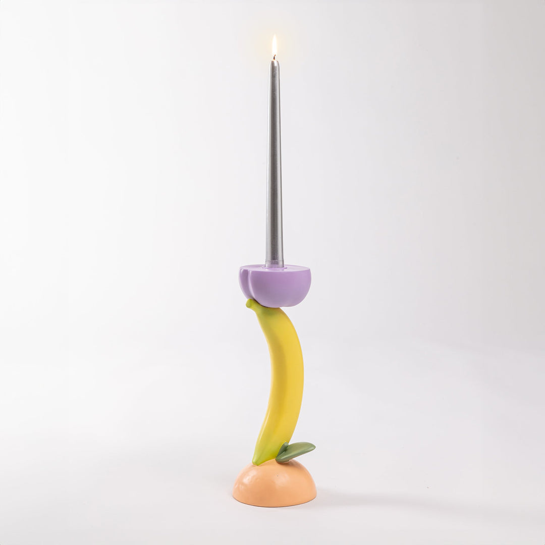 Seletti Vitamin Banana Candlestick, the banana candlestick with its taper lit