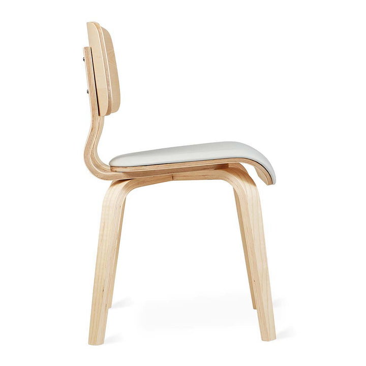 Elegant plywood chair with curved backrest and cream cushion, showcasing modern design
