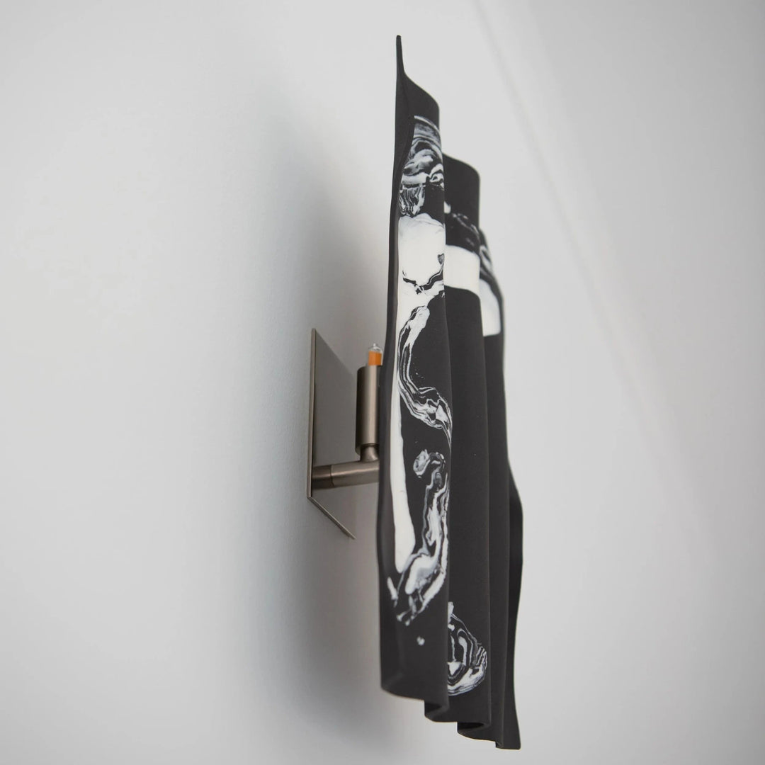 Drape Ceramic &amp; Brass Wall Light — Porcelain Inlay — Black stoneware with white porcelain inlay, angled view