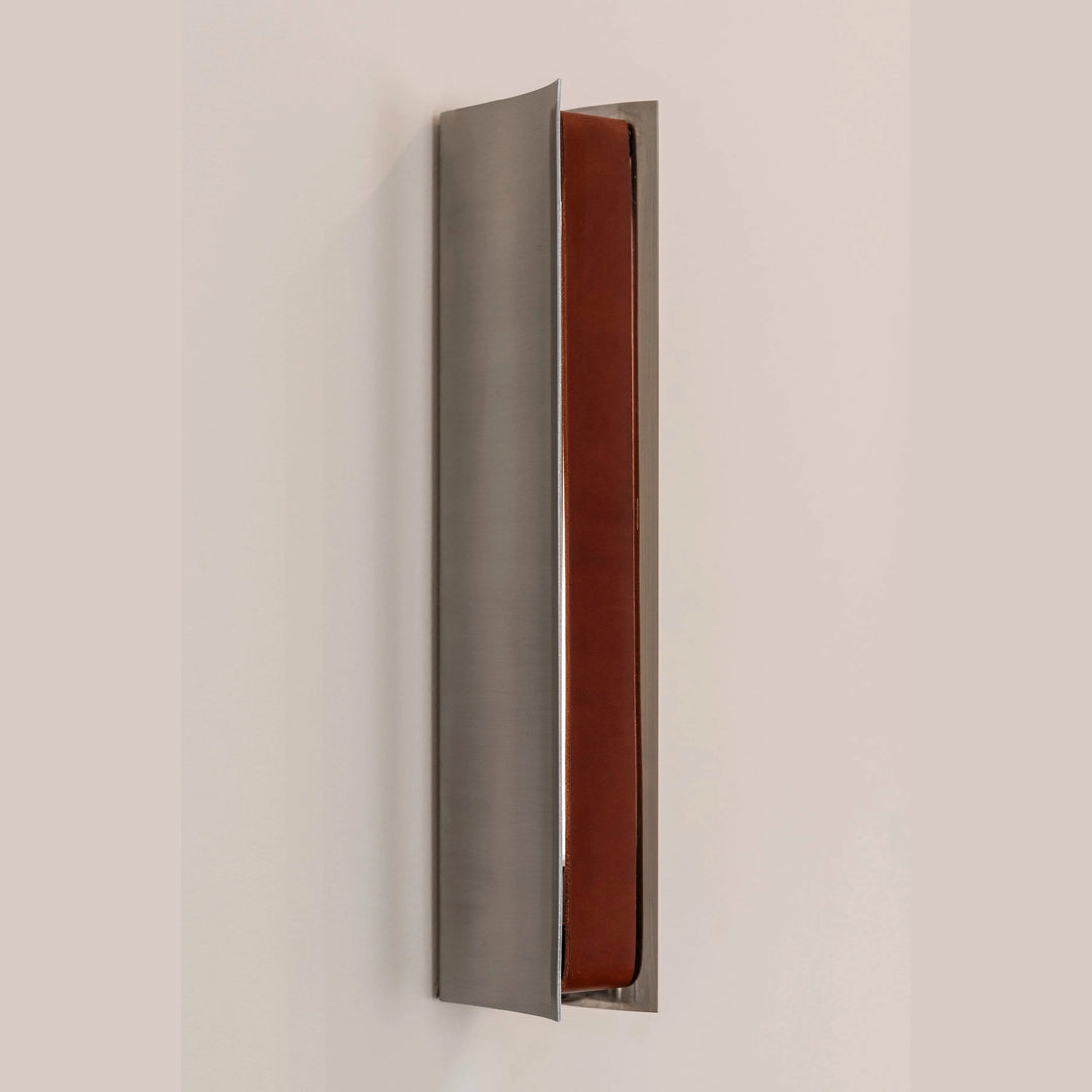 Impermanence Stainless Steel & Leather Wall Light — Brown leather insert, angled front view