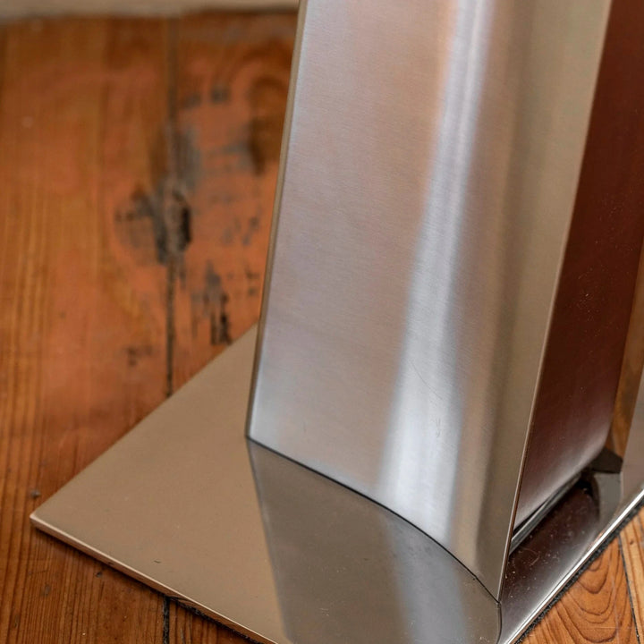 Impermanence Stainless Steel &amp; Leather Floor Light — detail of the stainless steel base and foot