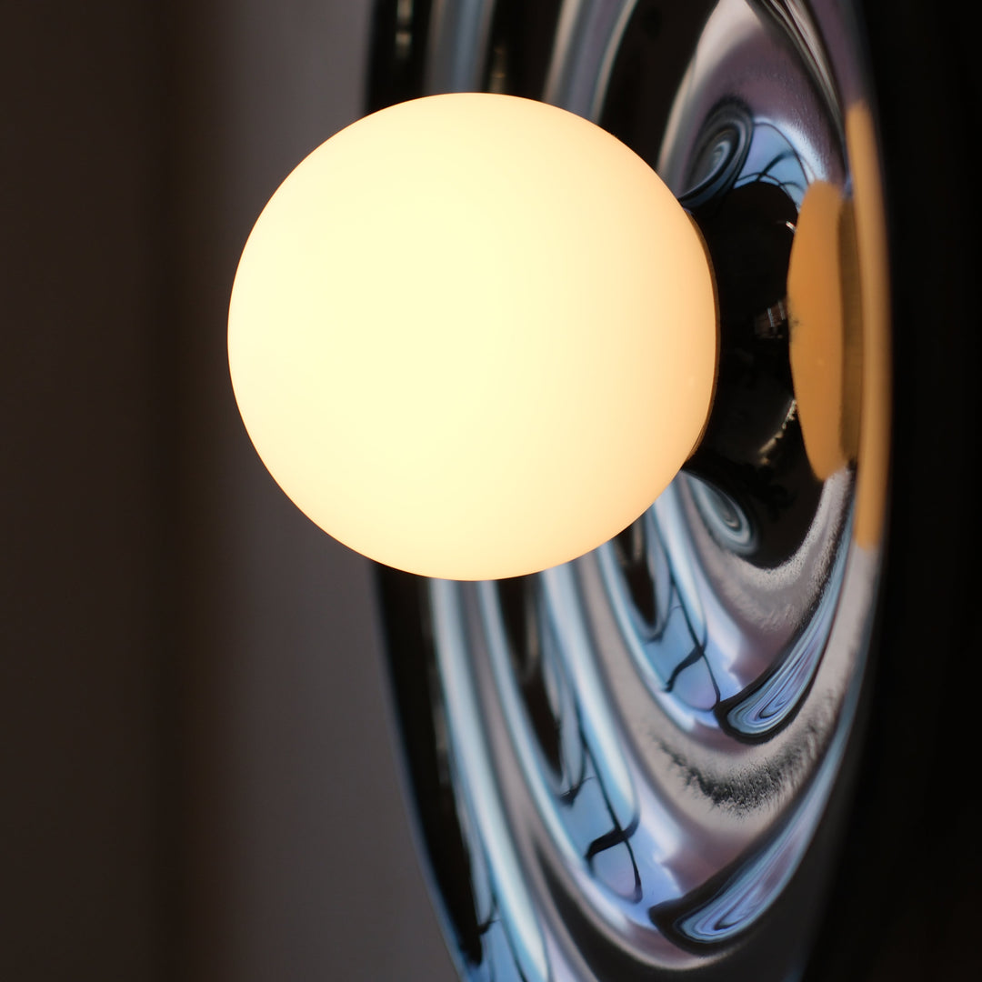 Globe lamp with polished chrome base, modern designer lighting