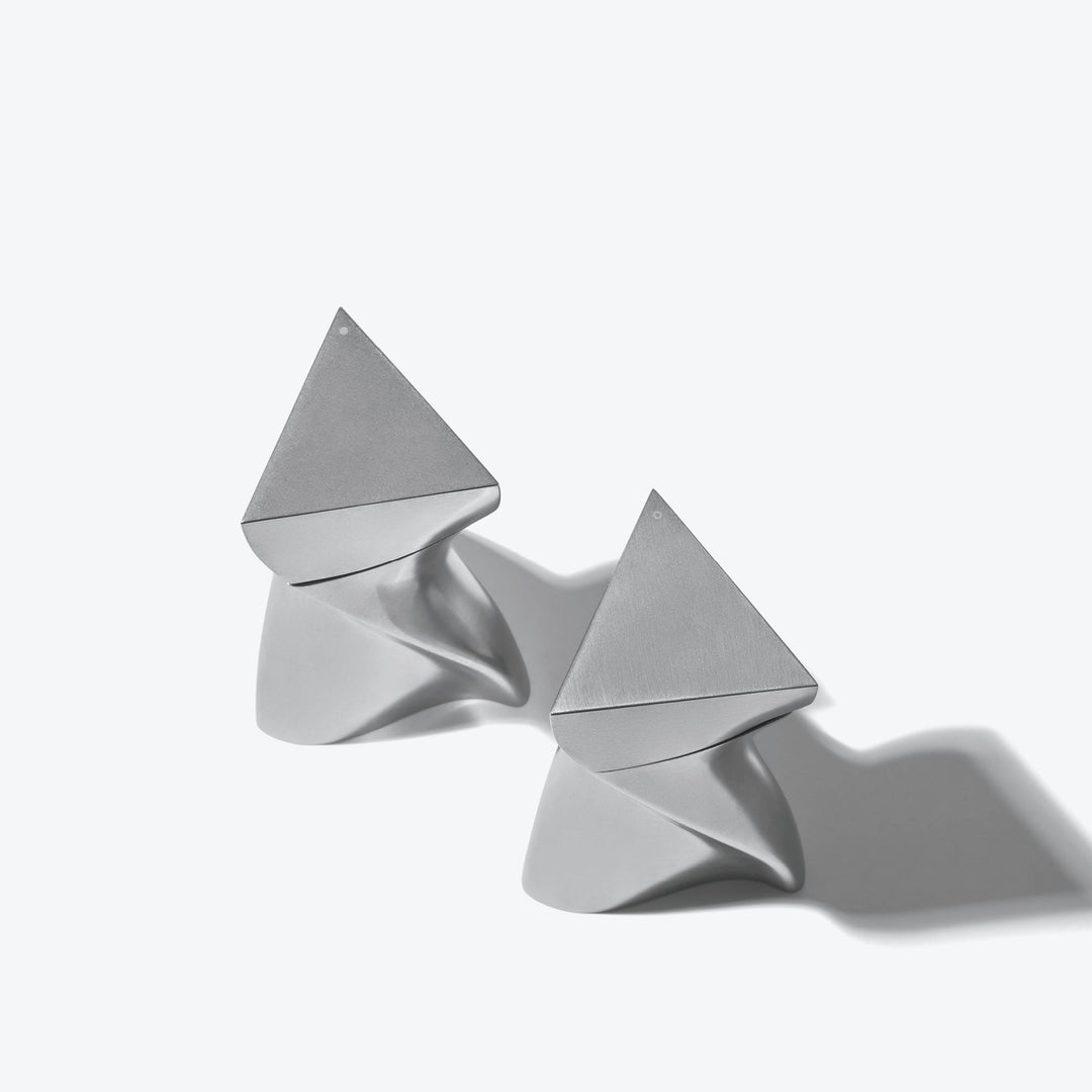 Duo Mini Salt and Pepper Grinder Set — All Silver grinders lying on their sides