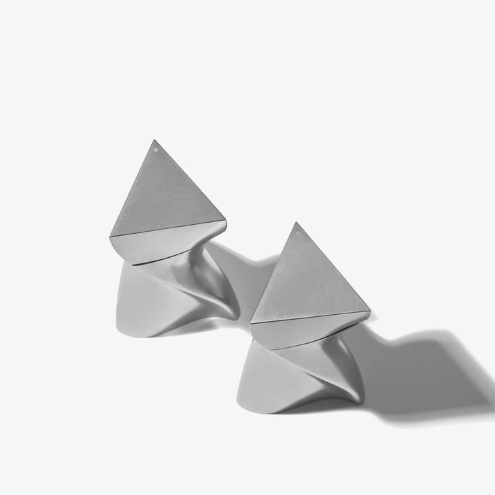 Duo Mini Salt and Pepper Grinder Set — All Silver grinders lying on their sides