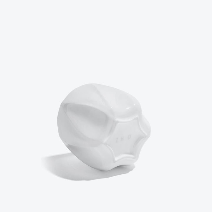 Folio Vessel, Set of 4 — small white vessel tipped on its side to show the base with ZHD mark