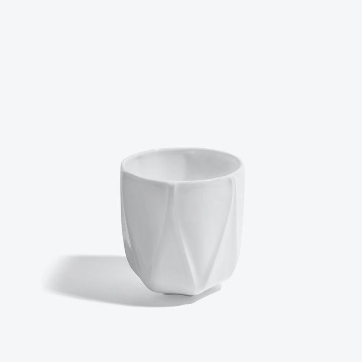 Folio Vessel, Set of 4 — medium white faceted porcelain vessel, front view on a white background
