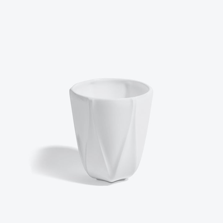 Folio Vessel, Set of 4 — large white faceted porcelain vessel, front view on a white background