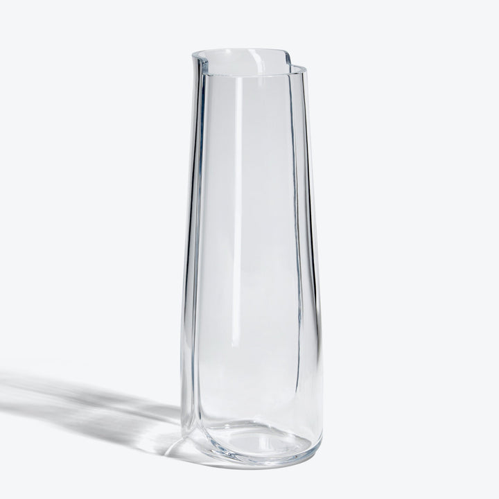 Hew Carafe — Clear glass carafe, full-height three-quarter view on white
