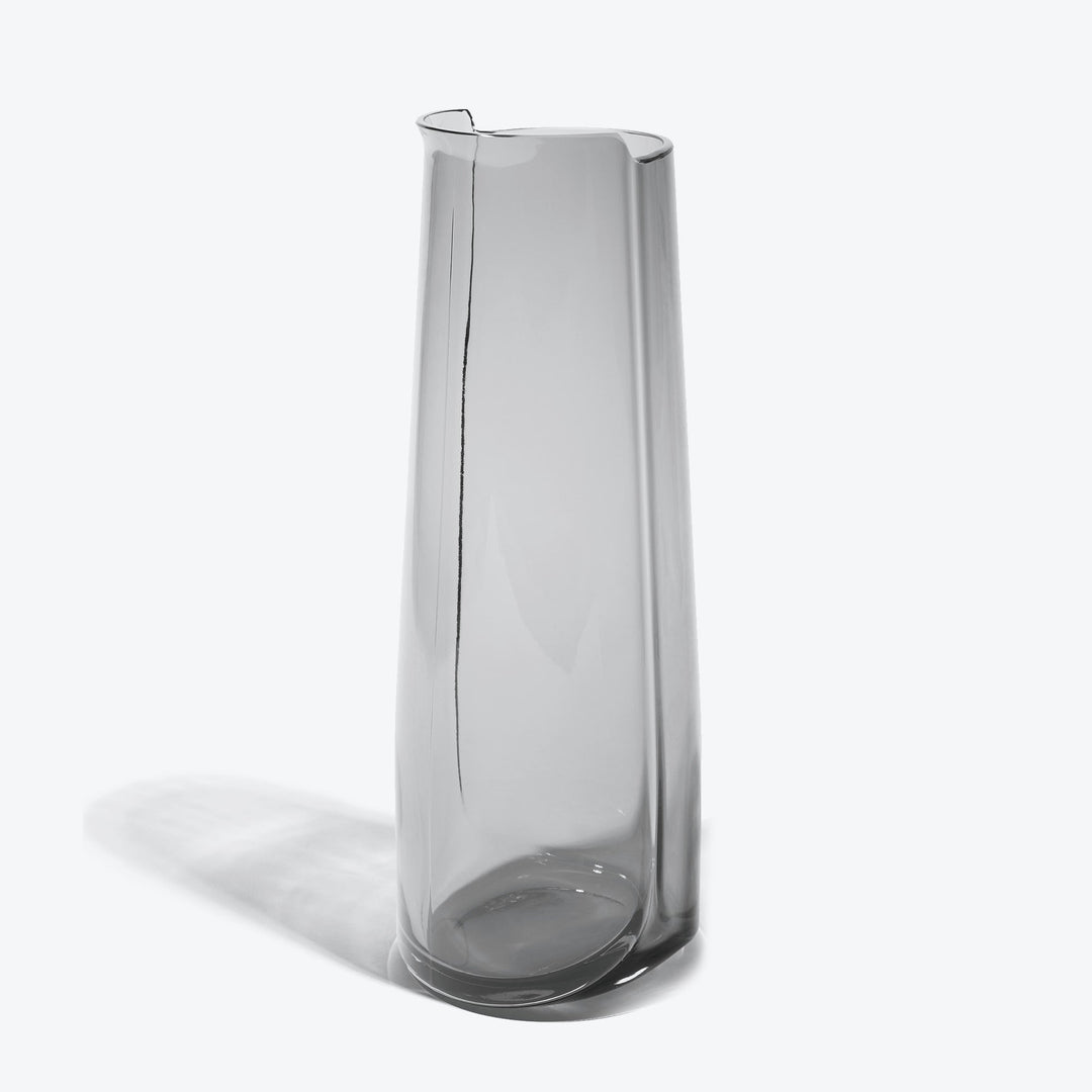Hew Carafe — Smoke glass carafe, full-height three-quarter view on white
