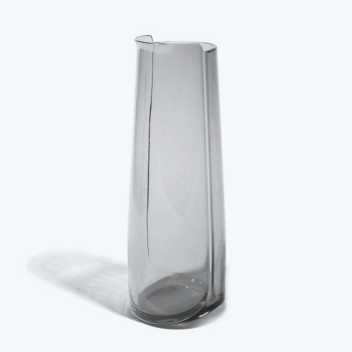 Hew Carafe — Smoke glass carafe, full-height three-quarter view on white