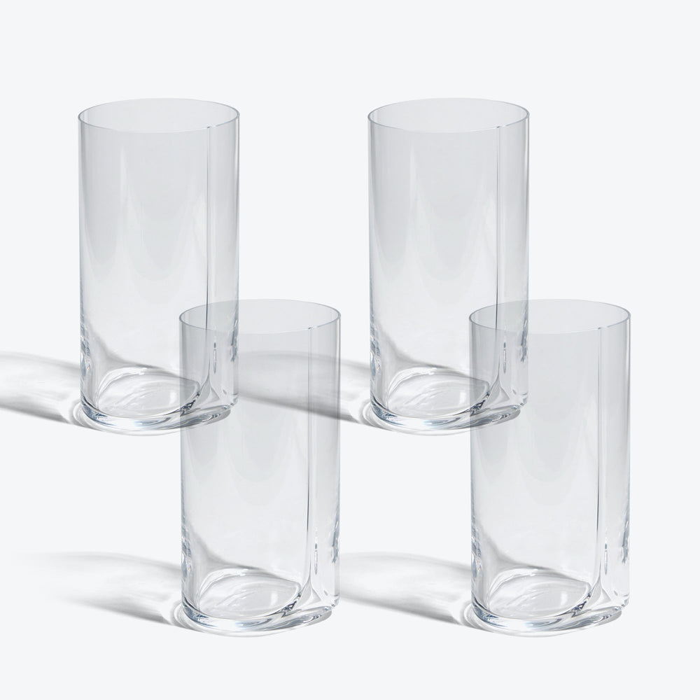 Hew Highball Glass, Set of 4 — four clear highball glasses arranged in two rows